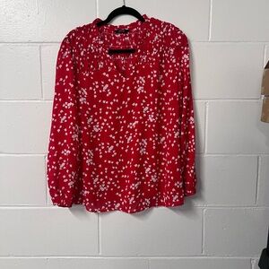 Red patterned blouse